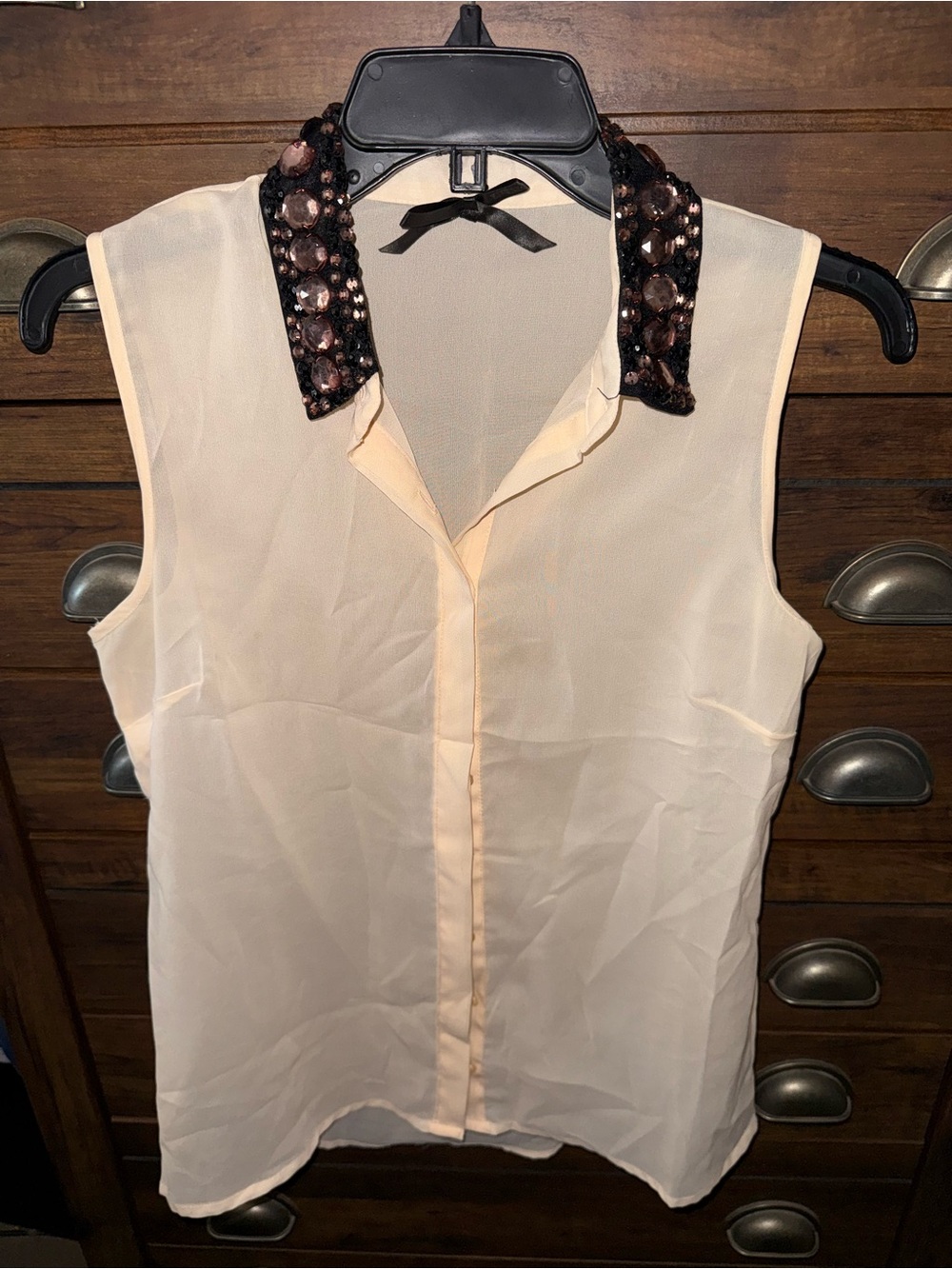 Ann Taylor Sleeveless Cream Blouse with Embellished Black Collar